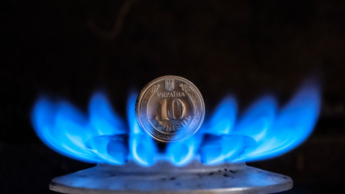 Газова конфорка та вогонь як ілюстрація спалювання газу